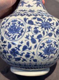 A Chinese blue and white 'lotus scroll' bottle vase, Transitional period