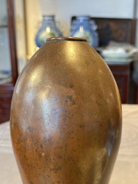 An unusual and large Chinese bronze vase, Ming