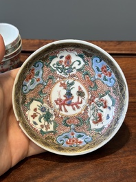 Nine Chinese famille rose cups and eight saucers, Yongzheng/Qianlong
