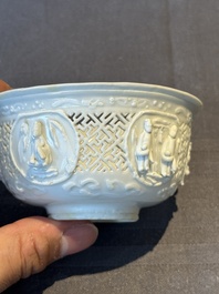 A pair of rare Chinese reticulated white-glazed biscuit 'Eight Immortals and Shoulao' bowls, Wanli