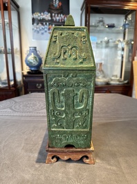 A rare large and inscribed archaistic bronze wine vessel, 'fang yi 方彝', Song/Ming