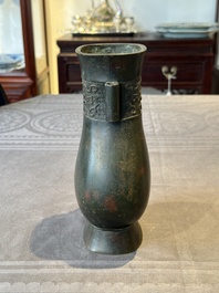 A Chinese silver-inlaid bronze arrow vase with Taotie design, 'touhu 投壺', Ming