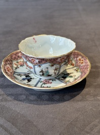 A Chinese famille rose cup and saucer with figures and animals, Yongzheng