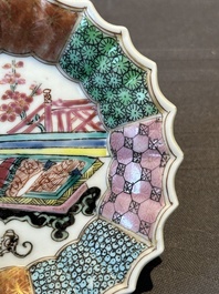 A Chinese famille rose cup and saucer with a reclined lady, Qianlong