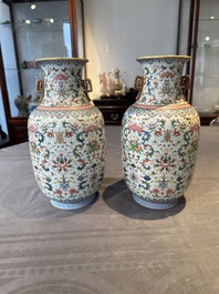 A pair of Chinese famille rose vases with floral design, Jiaqing mark, 19/20th C.