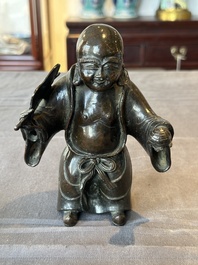 A Chinese bronze vase and a Taoist figure-shaped incense burner, Ming