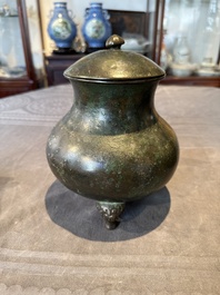 Two Chinese archaic bronze food vessels, 'ding 鼎', Han