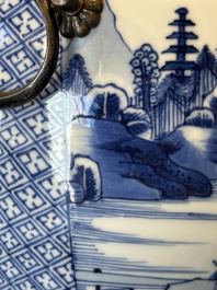A fine Chinese blue and white 'landscape and antiquities' bowl with silver handles, Kangxi