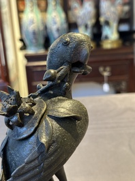 A rare Chinese bronze 'parrot' incense burner, Ming