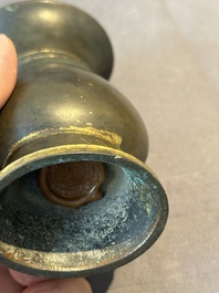 A rare Chinese parcel-gilt bronze ritual wine vessel, 'zhi 觯', Ming