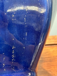 A pair of Chinese gilt-decorated powder-blue vases, Qianlong