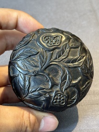 A Chinese huanghuali wooden box and cover with pomegranate design, 17/18th C.