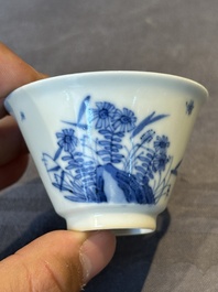 A Chinese blue and white 'erotic' cup and saucer, Kangxi