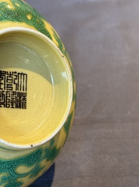 A pair of Chinese yellow-ground 'peach and bird' bowls, Qianlong mark and probably of the period