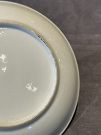 Two Chinese Canton famille rose 'mandarin subject' plates and a saucer, Qianlong
