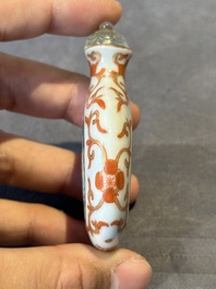 A fine Chinese famille rose snuff bottle with rock crystal stopper, Qianlong mark and of the period