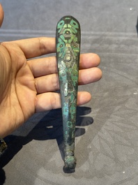 A varied collection of six Chinese bronze belt hooks, Warring States period and Western Han
