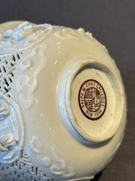 A pair of rare Chinese reticulated white-glazed biscuit 'Eight Immortals and Shoulao' bowls, Wanli