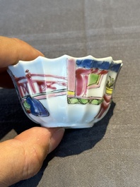 A Chinese famille rose cup and saucer with a reclined lady, Qianlong