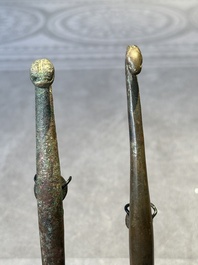 A varied collection of six Chinese bronze belt hooks, Warring States period and Western Han