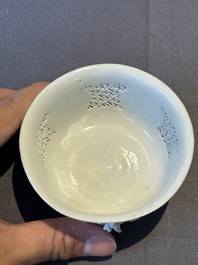 A pair of rare Chinese reticulated white-glazed biscuit 'Eight Immortals and Shoulao' bowls, Wanli