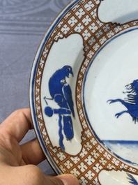 A pair of Chinese 'leaping pekinese' plates, possibly after a design by Cornelis Pronk, Qianlong, ca. 1740