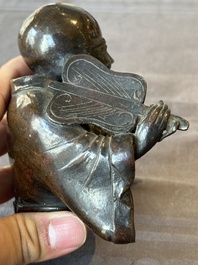 A Chinese bronze vase and a Taoist figure-shaped incense burner, Ming
