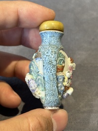 A Chinese moulded famille rose 'playing boys' snuff bottle, Qianlong mark, 19th C.