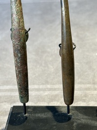 A varied collection of six Chinese bronze belt hooks, Warring States period and Western Han