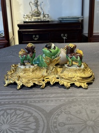 A French ormolu inkwell inset with Chinese verte biscuit porcelain, 19th C. and Kangxi