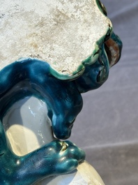 A Japanese polychrome-glazed group of playing Buddhist lions, 18/19th C.