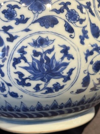 A Chinese blue and white 'lotus scroll' bottle vase, Transitional period