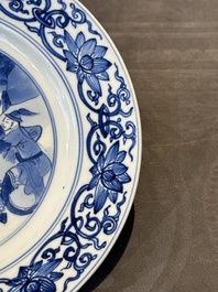 A pair of Chinese blue and white 'hunting scene' plates, Qi Yu Bao Ding Zhi Zhen 奇玉寶鼎之珍 mark, Kangxi