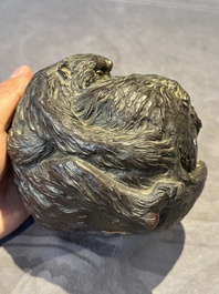 A Japanese bronze okimono with three monkeys, Yoshinobu seal mark, Meiji period