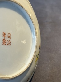 A pair of Chinese yellow-ground famille rose plates with butterfly design, Tongzhi mark, 20th C.