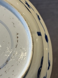 A Chinese blue and white 'hunting scene' 'klapmuts' bowl and a vase with a silver cover, Kangxi