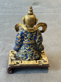 A Chinese gilt and champlev&eacute; enamelled bronze Bodhisattva on a carved stone stand, Qing