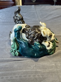 A Japanese polychrome-glazed group of playing Buddhist lions, 18/19th C.