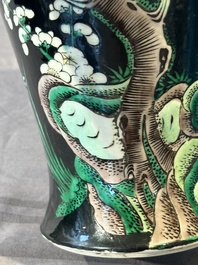 A Chinese famille verte black-ground vase and a pair of turquoise-glazed Buddhist lions, 19/20th C.