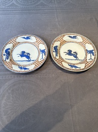 A pair of Chinese 'leaping pekinese' plates, possibly after a design by Cornelis Pronk, Qianlong, ca. 1740