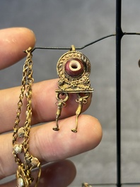 Three pairs of gold earrings with pearls and two gold pendants, Roman Era, 2nd/3rd C.