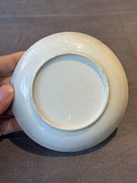 A Chinese Canton famille rose 'mandarin subject' covered teapot and a pair of saucers, Qianlong