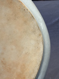A Chinese Canton famille rose dish with a lady, servant and pheasants, 19th C.