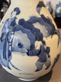 A Chinese blue and white bottle vase with court ladies and playing boys, Chenghua mark, Kangxi