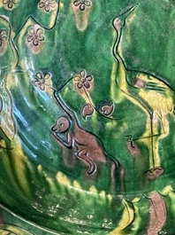 A Chinese sancai-glazed flower-shaped 'crane' plate, Ming