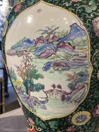 A pair of Chinese famille rose black-ground jars and covers with mountainous landscape design, Yongzheng