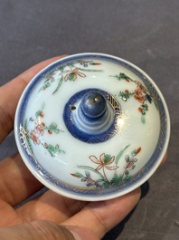 A Chinese famille verte teapot and a famille rose black-ground teapot, Kangxi/Yongzheng