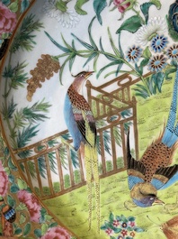 A Chinese Canton famille rose dish with a lady, servant and pheasants, 19th C.