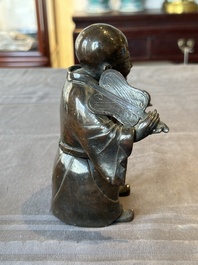 A Chinese bronze vase and a Taoist figure-shaped incense burner, Ming