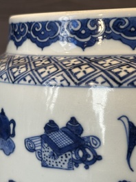 A fine Chinese blue and white 'landscape and antiquities' bowl with silver handles, Kangxi